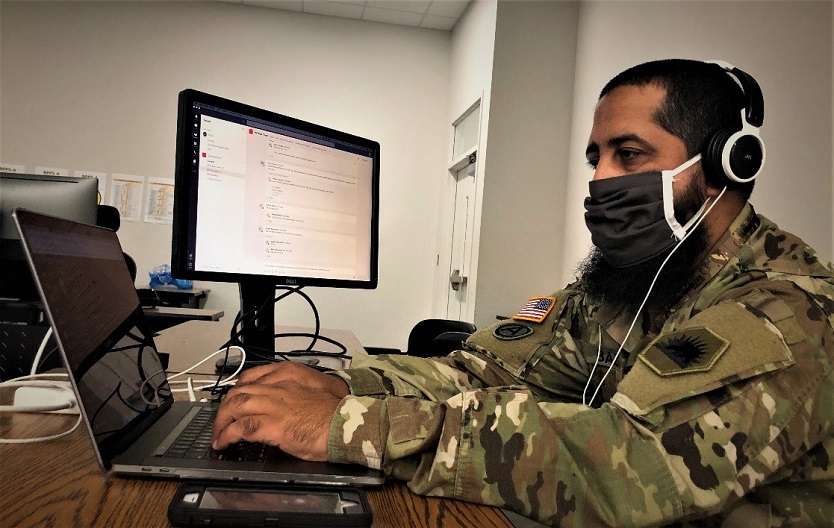 Soldier working with computers